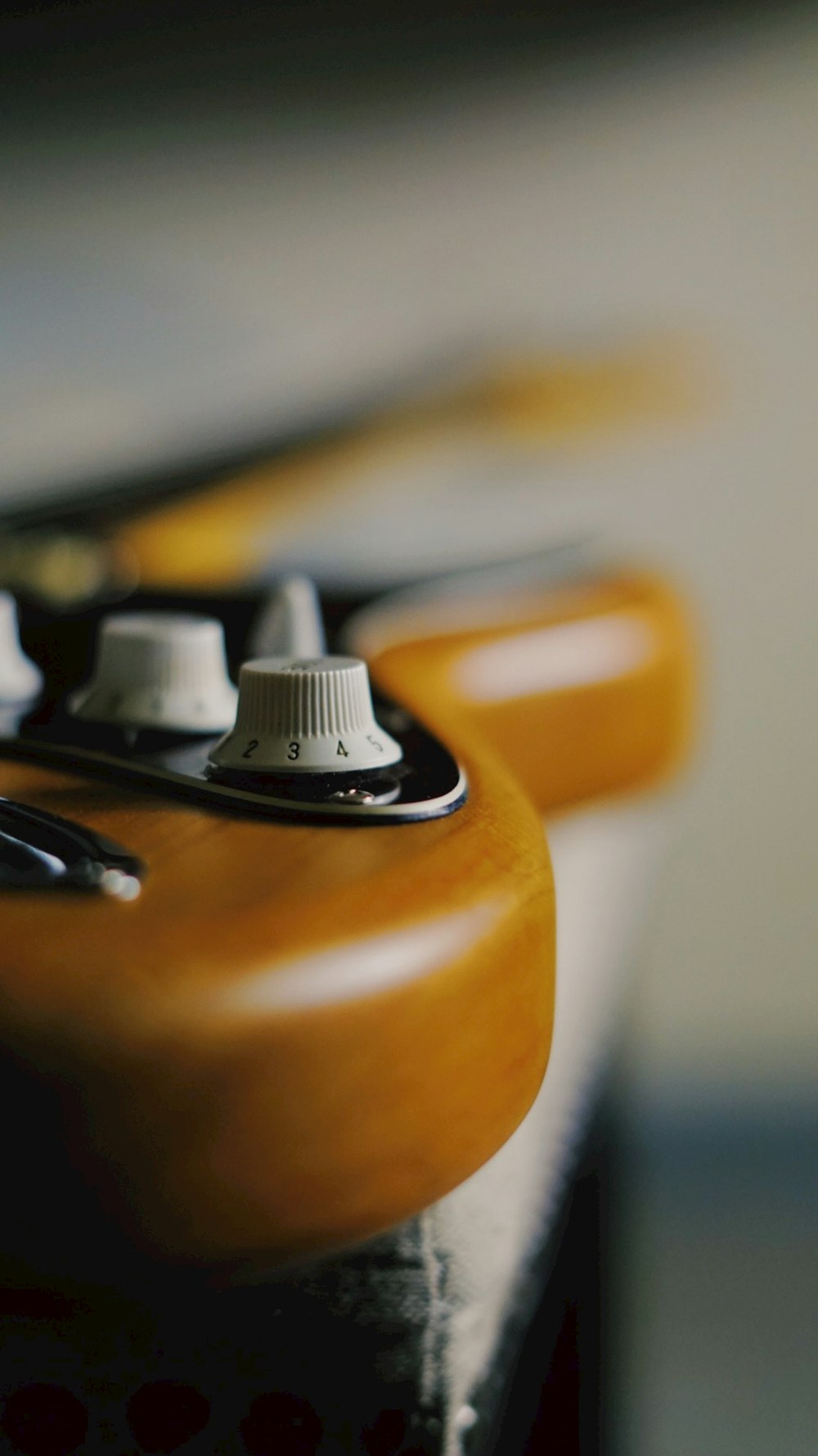 brown and black guitar head stock