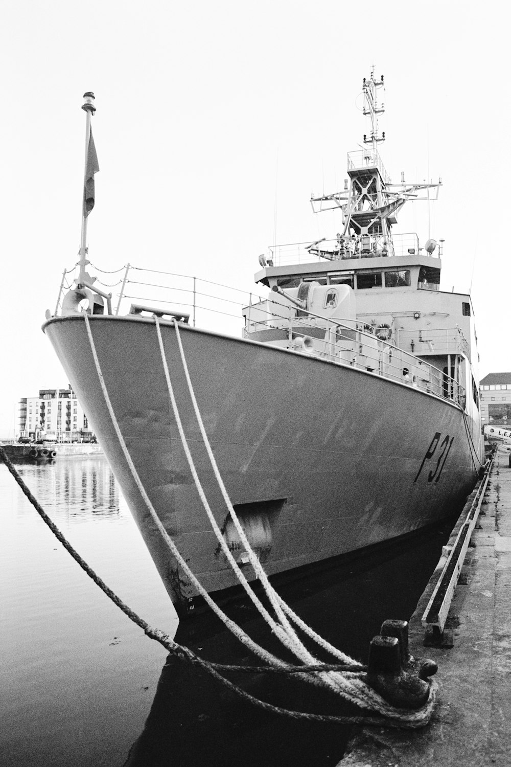 grayscale photo of ship on water