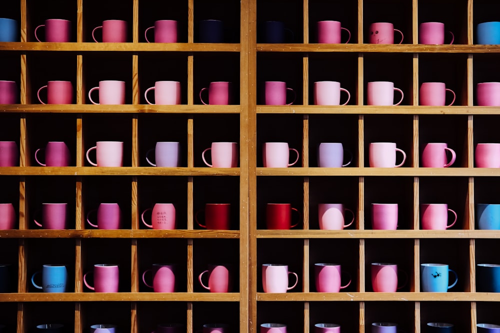 pink and brown egg on brown wooden shelf