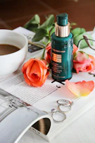 A serene morning scene with vancura serum bottle beside a sunlit window and fresh flowers.