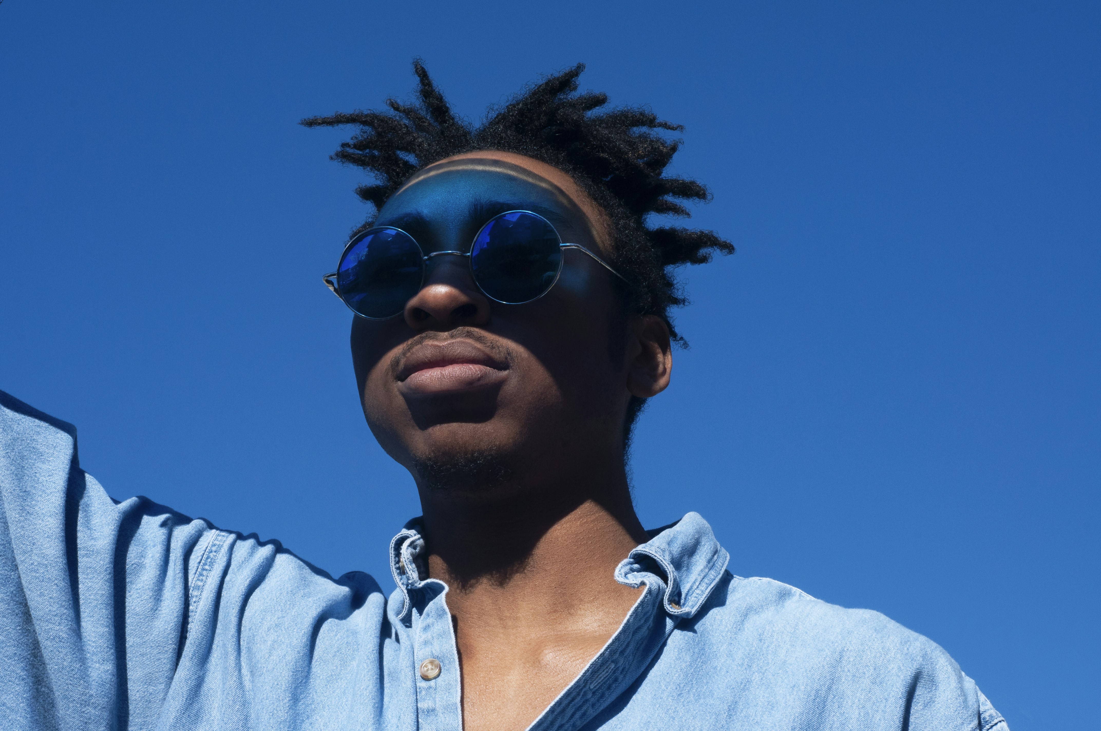 The theme for the day was the color blue. Me and my friends went to an open field in Ohio and started playing around with different objects and how they interacted with the sun. This one was my favorite from the shoot.