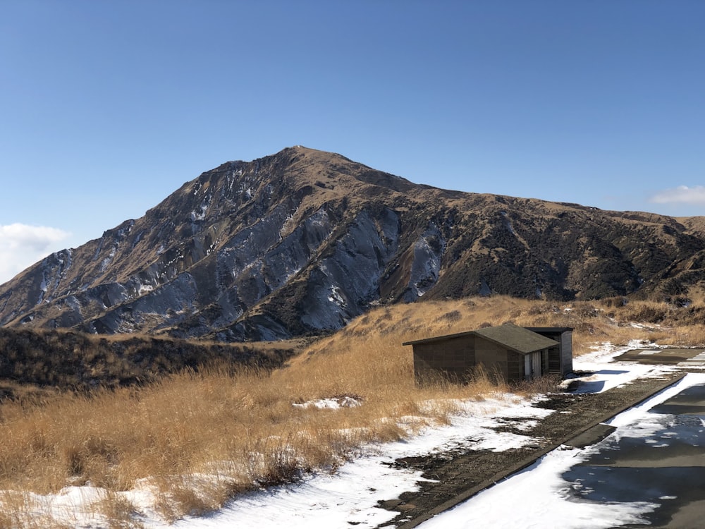 brown and gray mountains under blue sky during daytime