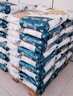 white blue and green plastic packs