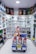 assorted food cans on white shelf