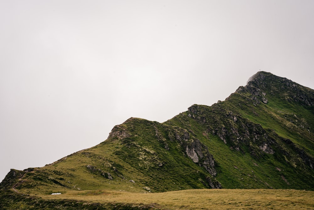 green mountain under white sky during daytime