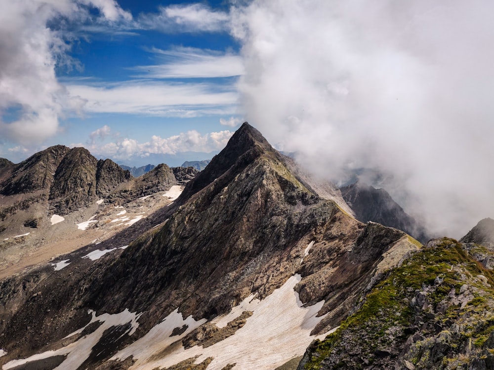 gray and white mountain under blue sky during daytime