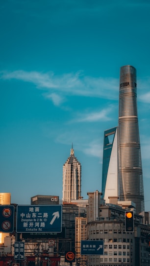 A professional team discussing trade strategies with a backdrop of Guangzhou city skyline.