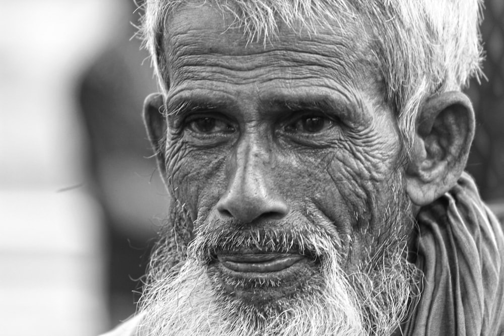 grayscale photo of mans face