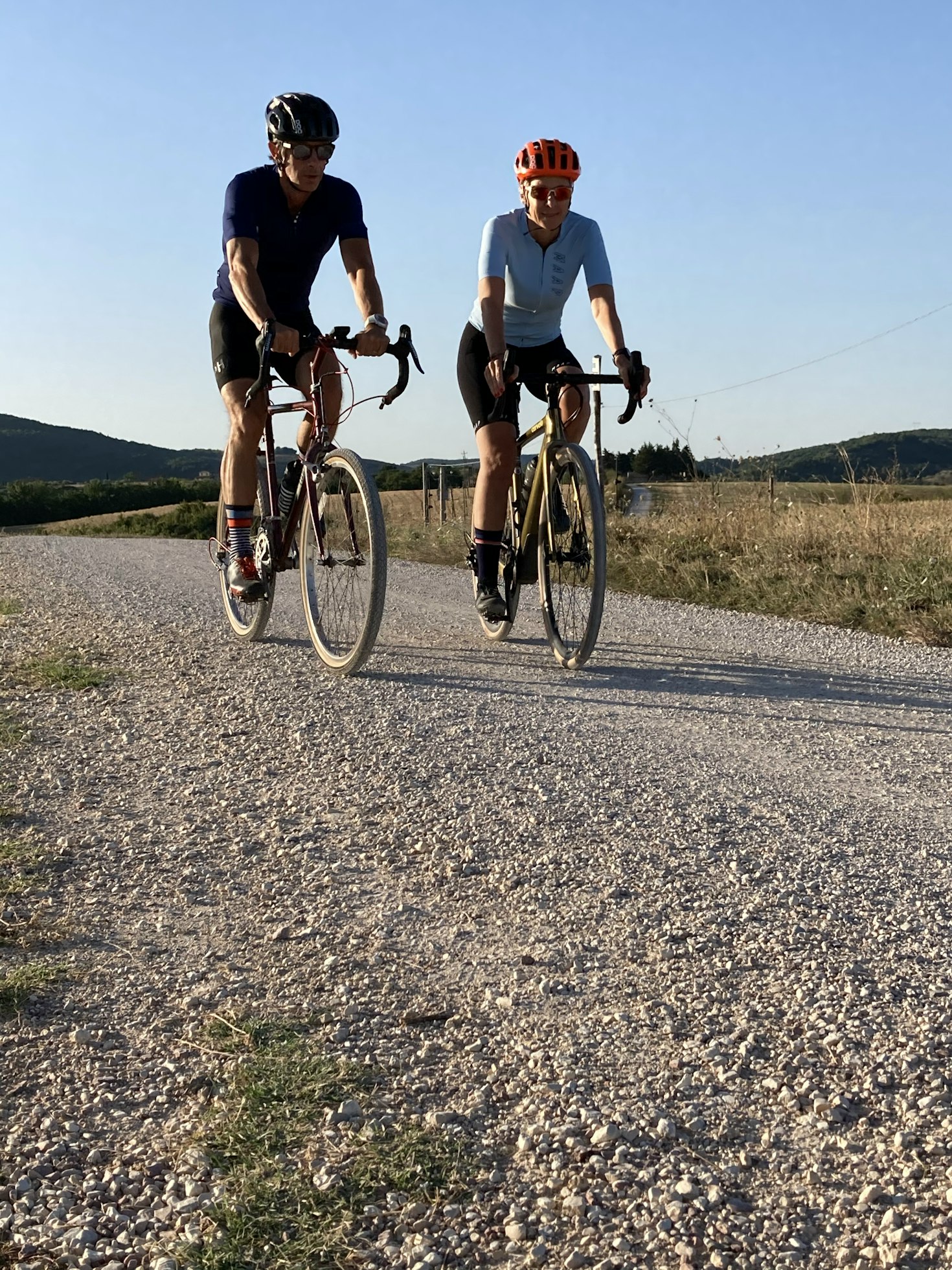 Couple cycling on gravel bikes