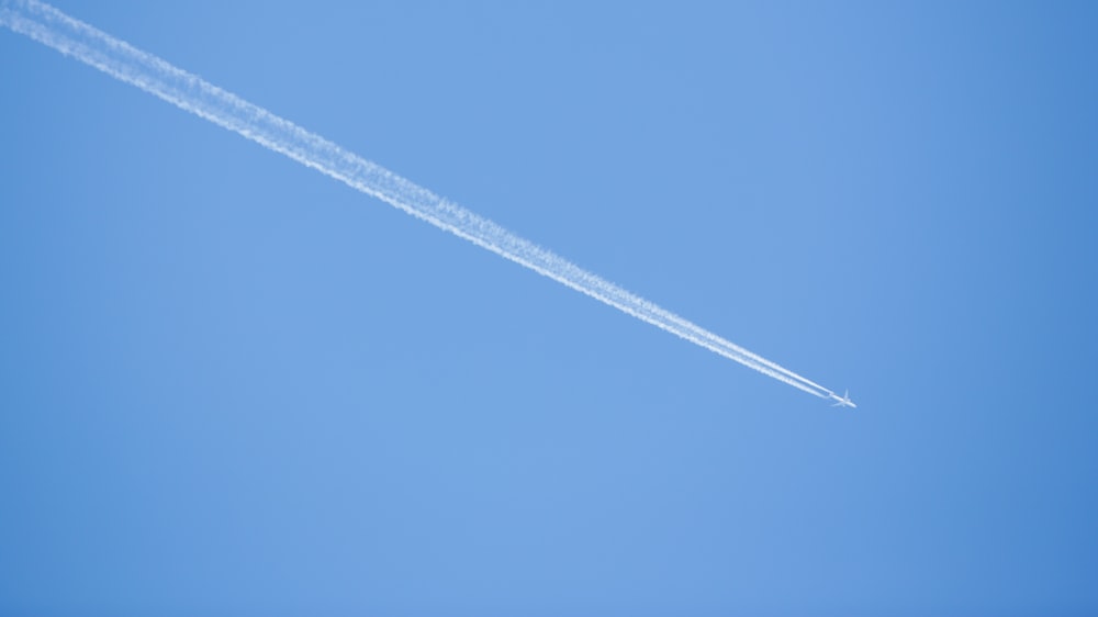 white string on blue sky