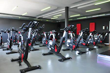 black and red stationary bikes
