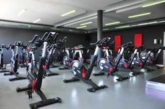 black and red stationary bikes