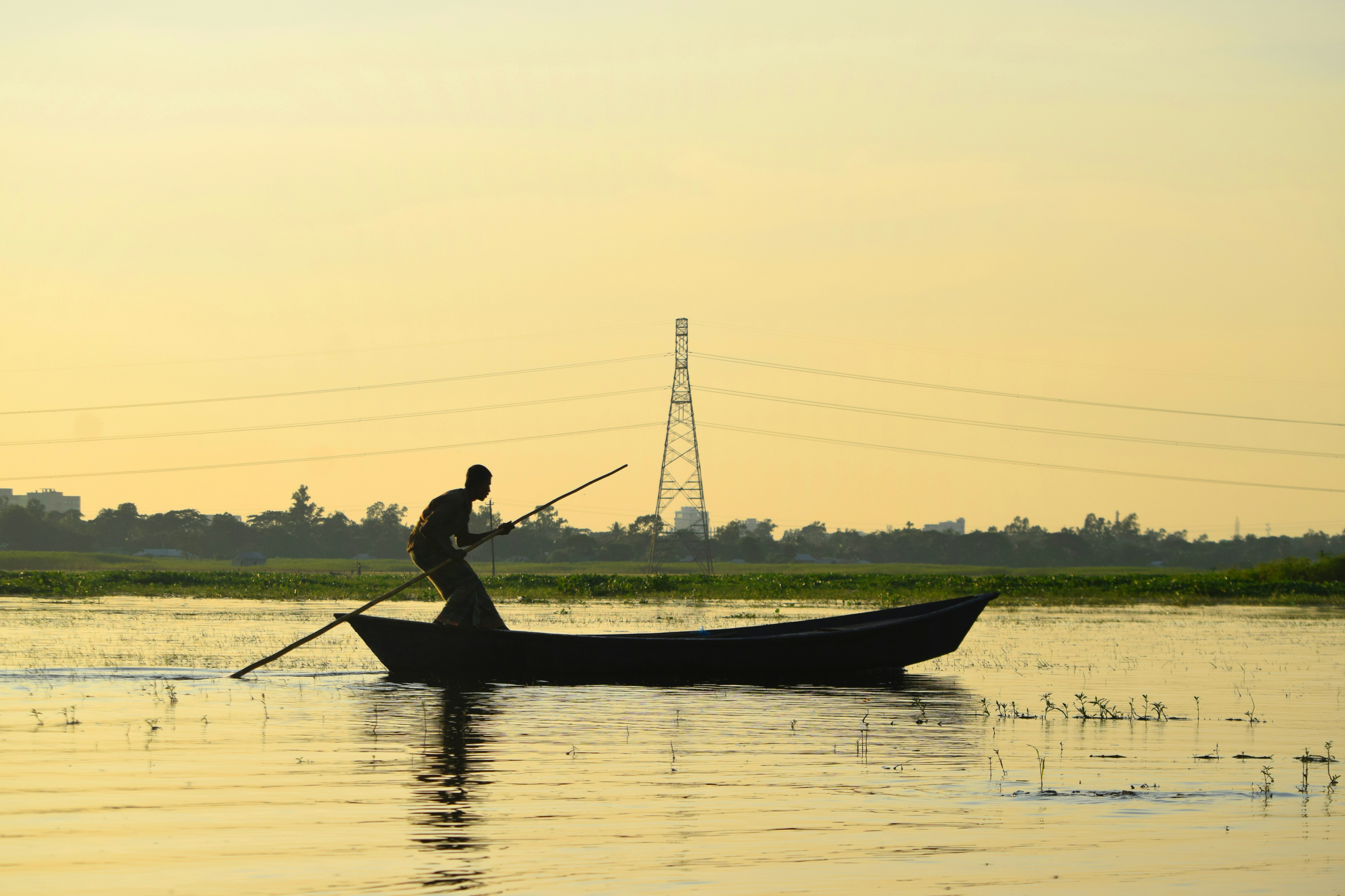 man in black shirt riding on boat during daytime