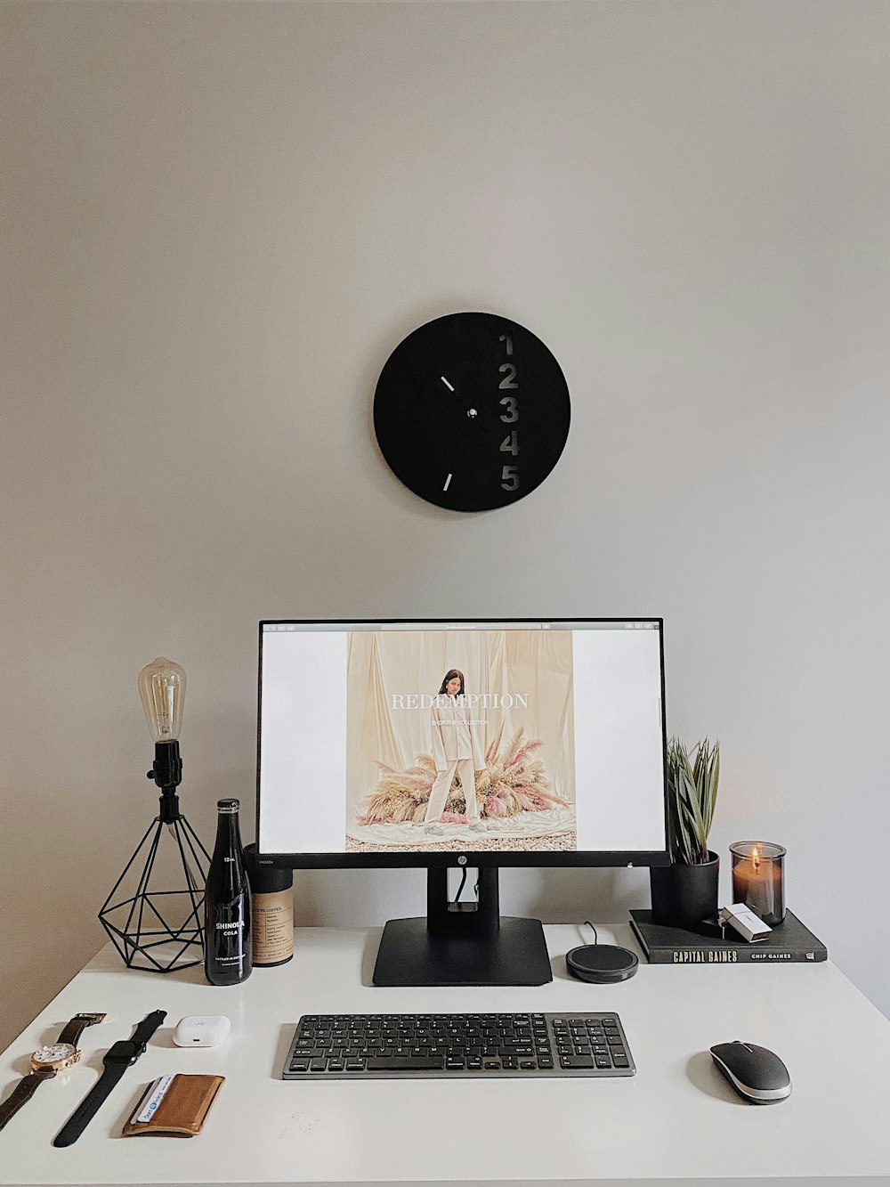 black flat screen tv on brown wooden table