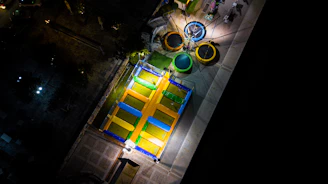 A completed trampoline park bustling with happy families and children.