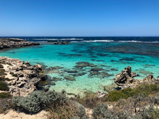 blue sea under blue sky during daytime