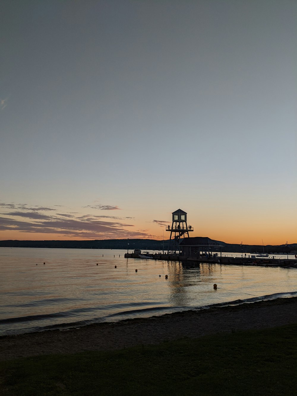 silhouette of people on beach during sunset