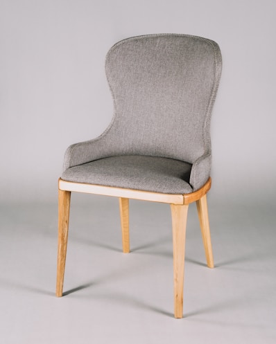 gray and white padded chair