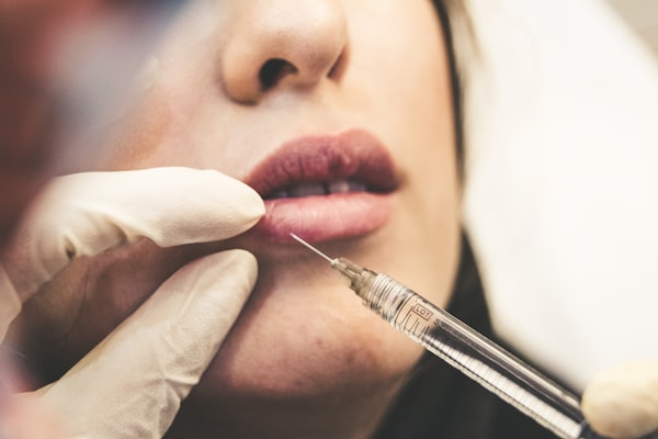 Botox injection treatment being administered with precision