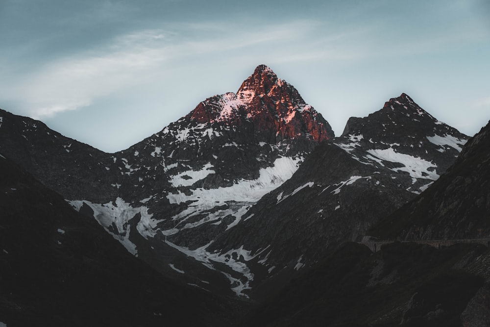 snow covered mountain during daytime