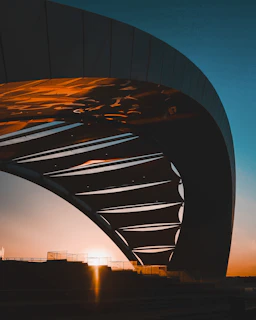 Finished construction project highlighting sturdy structure and clean architectural lines at sunset.