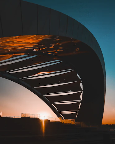 Finished construction project highlighting sturdy structure and clean architectural lines at sunset.