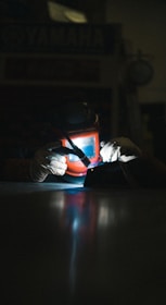 man in black and white jacket wearing black helmet