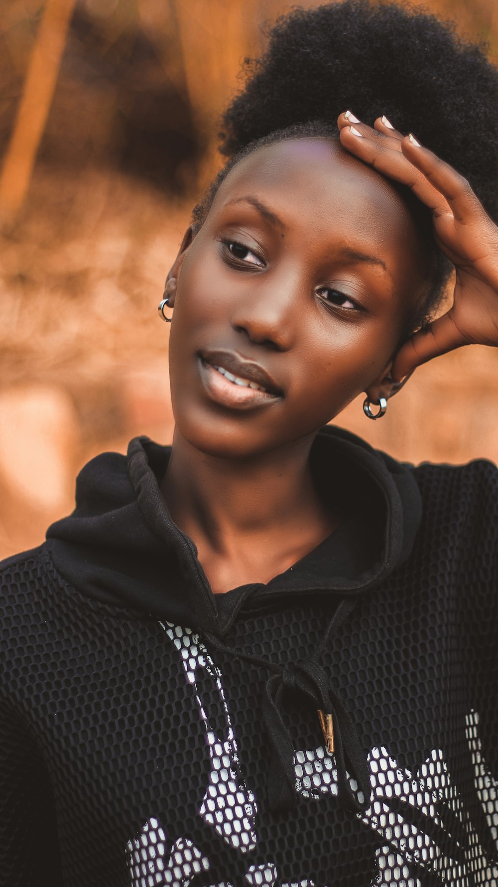 woman in black and white shirt