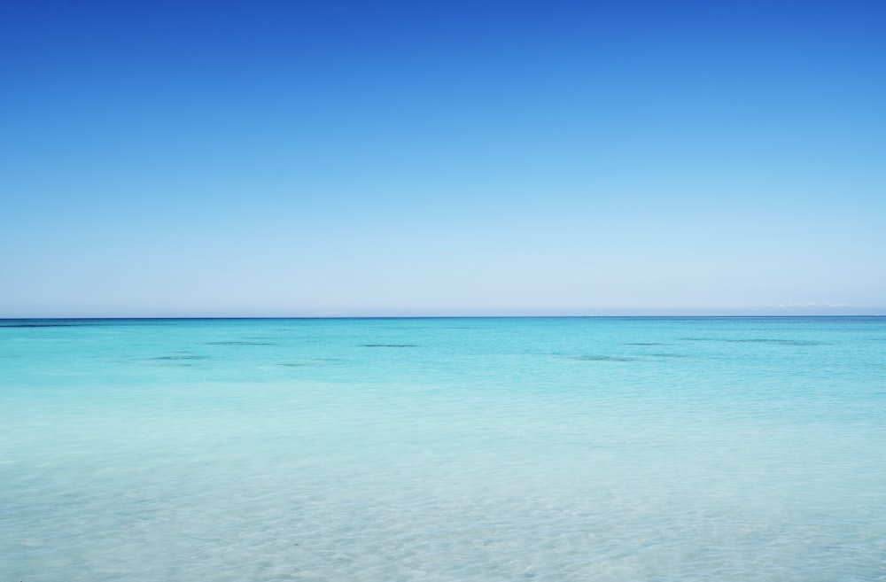 blue sea under blue sky during daytime