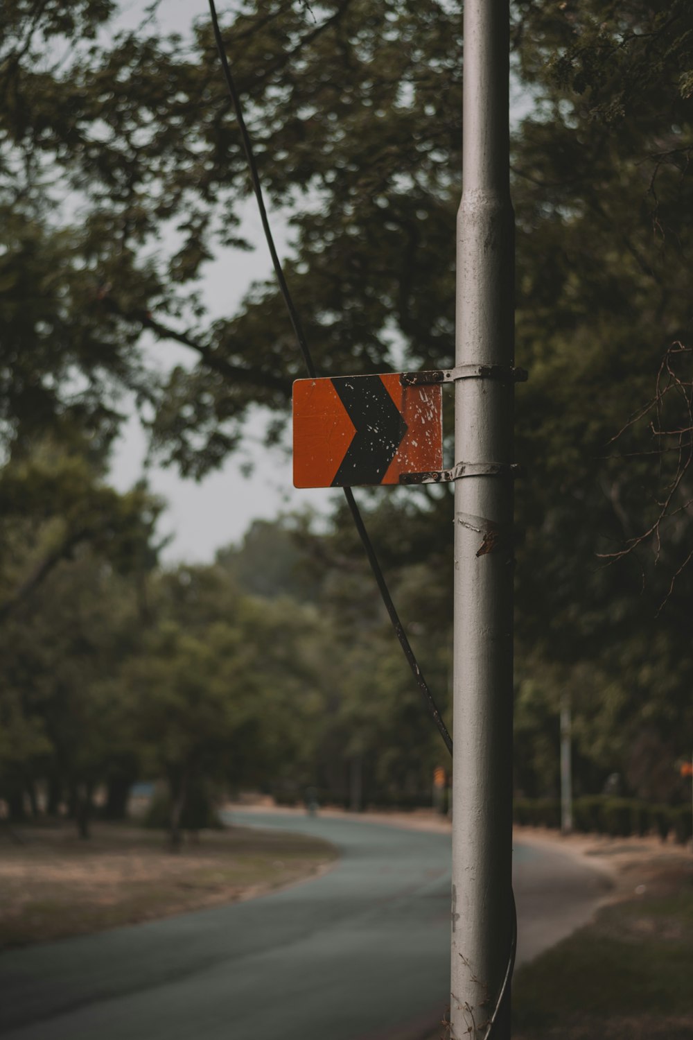 red and black road sign