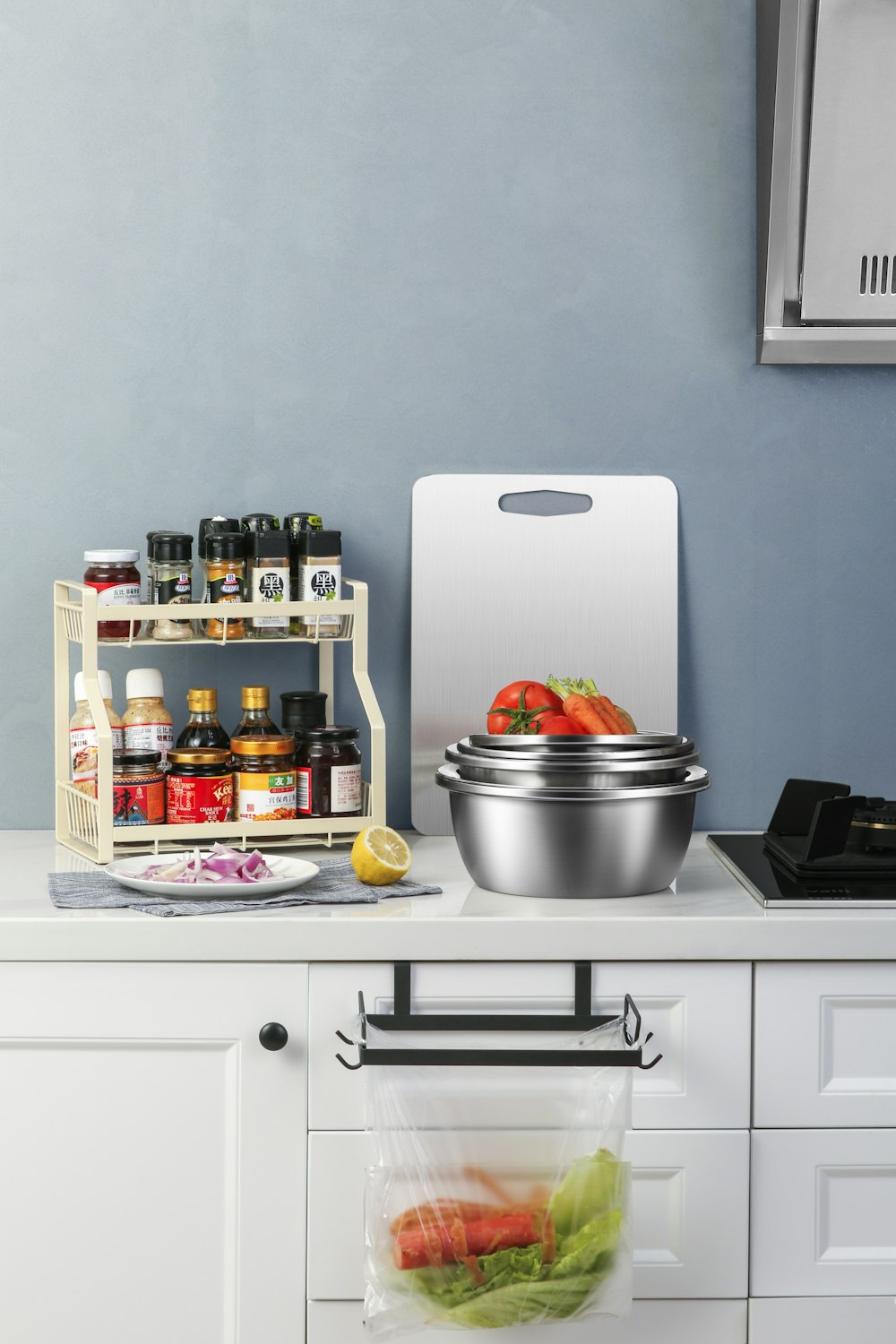 stainless steel cooking pot on white wooden table