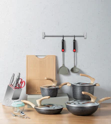stainless steel cooking pot on brown wooden table