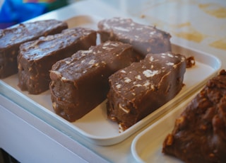 chocolate cake on white plastic container