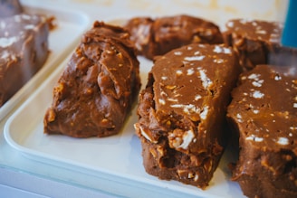 A beautifully arranged platter of various fudge flavors.