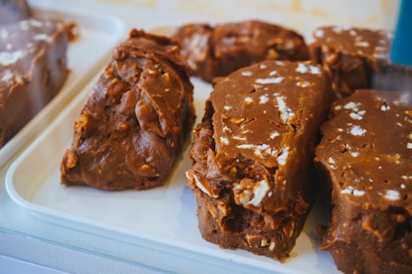 A beautifully arranged platter of various fudge flavors.