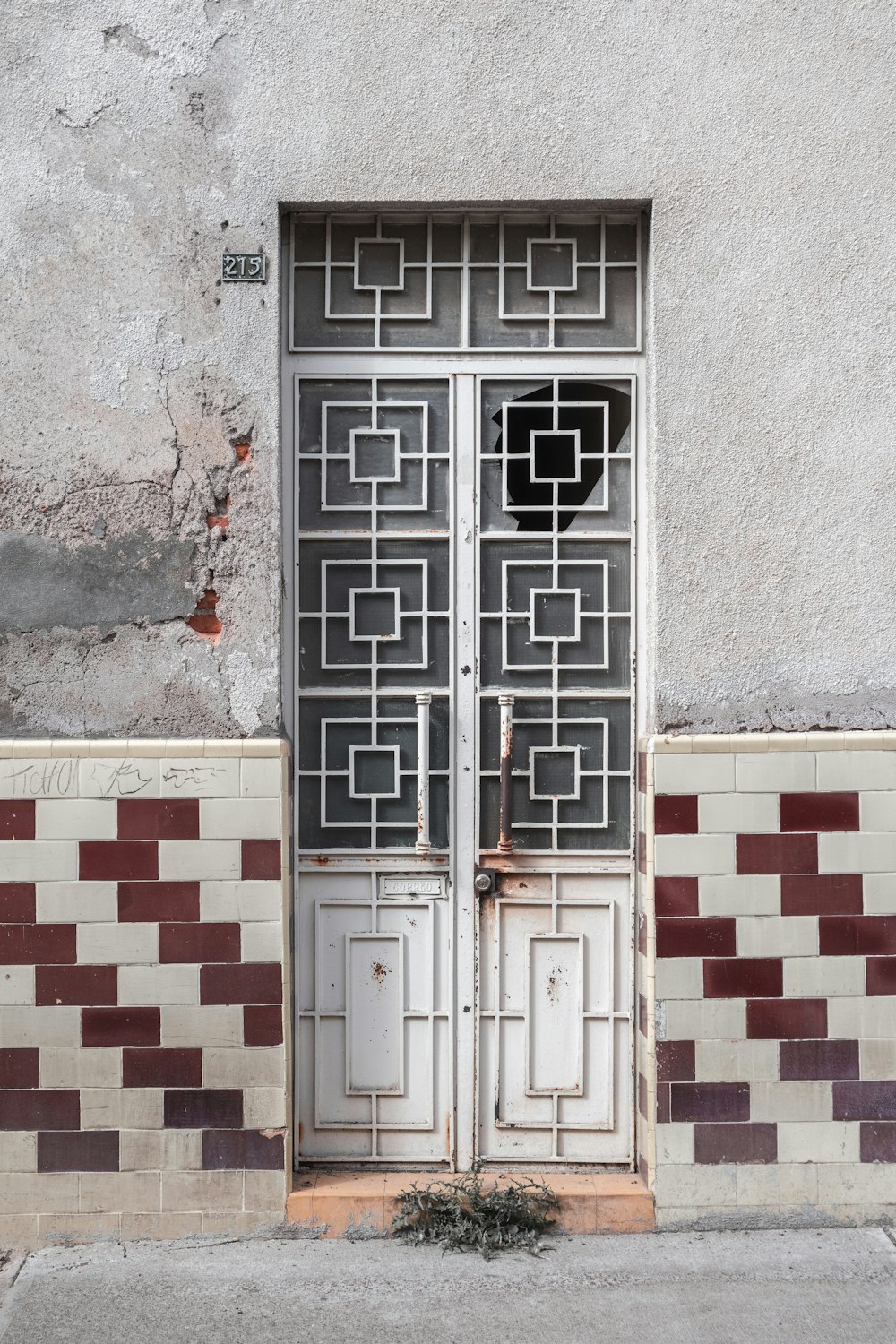 white and red wooden door