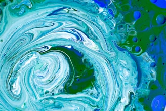 Abstract colorful marbles arranged in a spiral pattern symbolizing creative thinking.