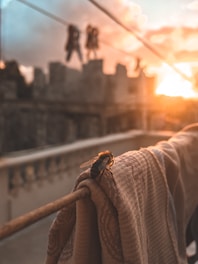 Close-up of a peaceful guest resting inside a softly lit bee-themed cabin with honey-gold accents.