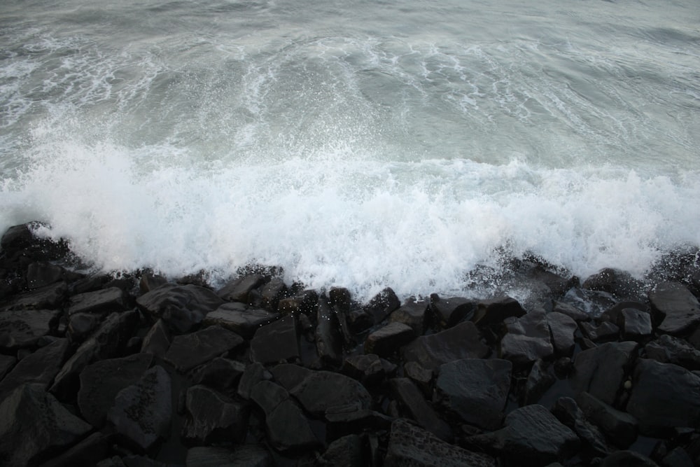 ocean waves crashing on rocks