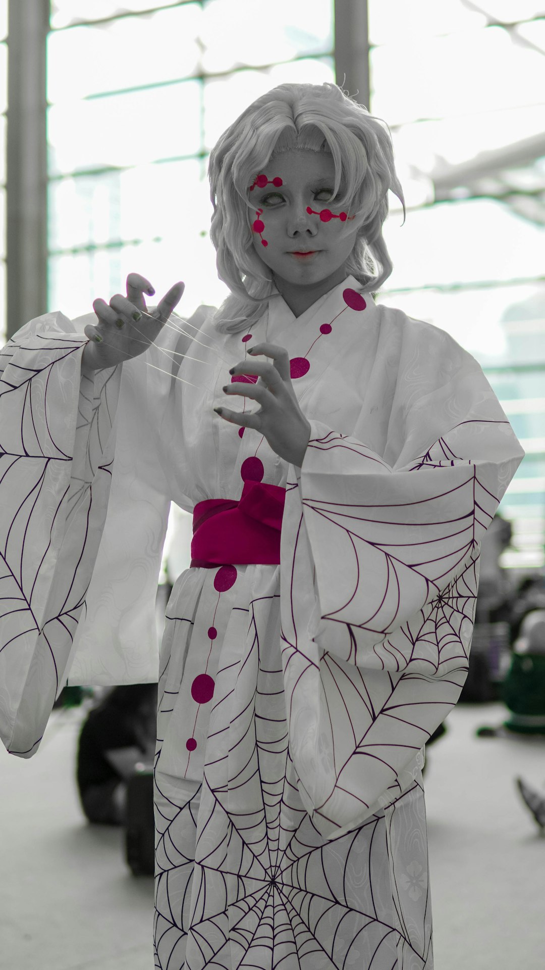 woman in white and black floral kimono
