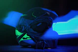 Close-up of a sleek Yamaha motorcycle helmet with vibrant blue and white colors.