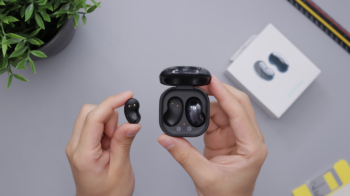 Wireless earbuds in charging case