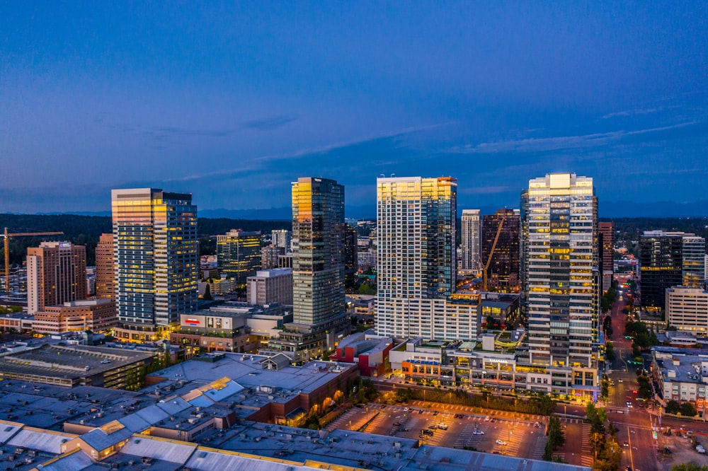 city buildings under blue sky during daytime