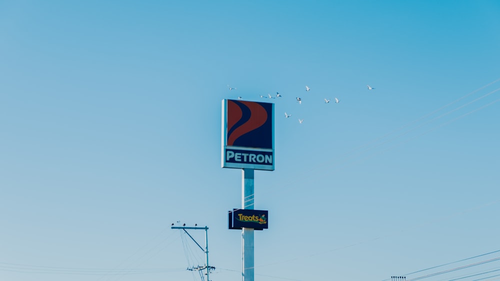 white and red stop sign