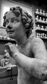 Close-up of a detailed sculpture created by a teenage participant at the fair.