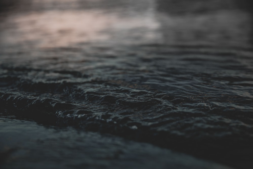 water waves on brown sand