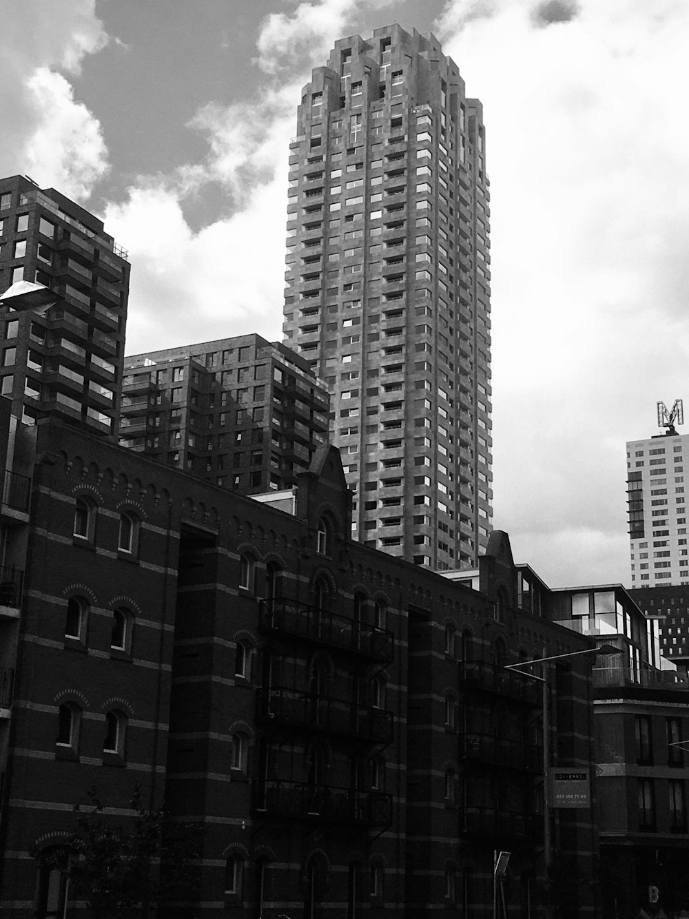 grayscale photo of high rise building