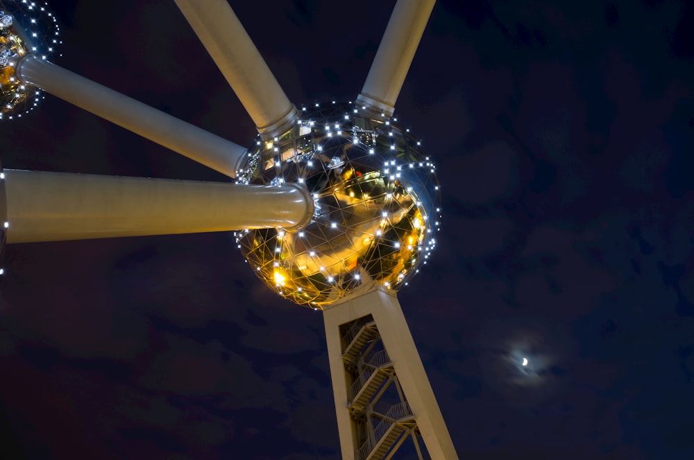 yellow metal tower during night time