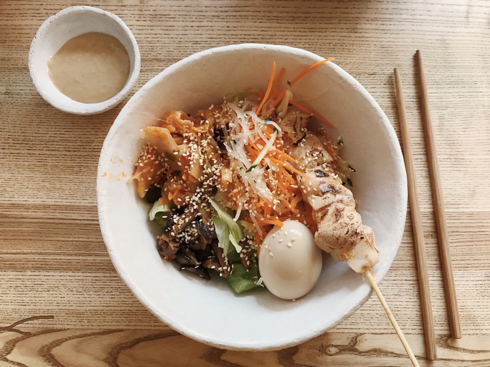 cooked food on white ceramic bowl