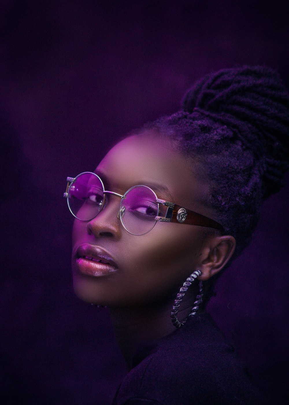 woman in silver framed eyeglasses